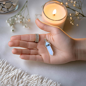 Pendant with opalite in pouch + chain